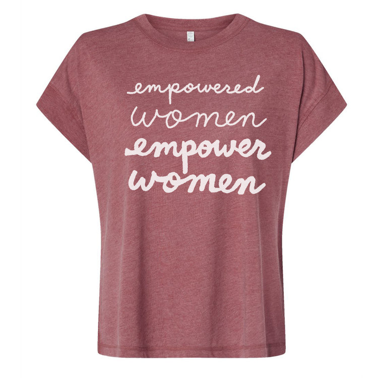 A maroon t-shirt with the text "empowered women empower women" printed on it in white cursive font.