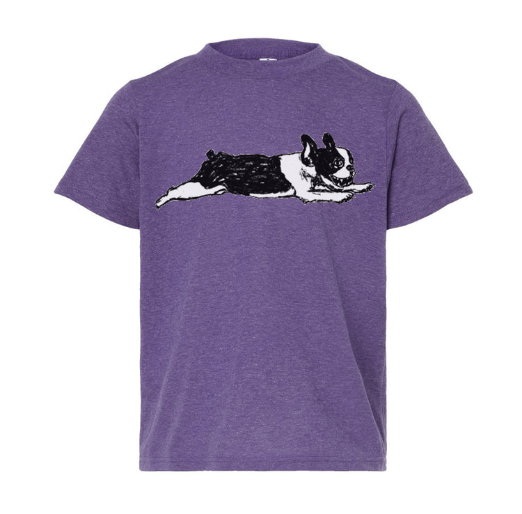 A purple t-shirt with a graphic of a black and white dog lying down.