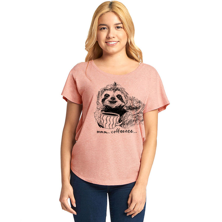 A woman wearing a pink t-shirt with a sloth graphic and the text "Mmm...coffee..." printed on it.