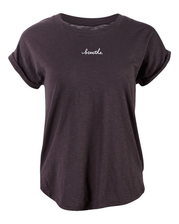 A dark purple t-shirt with the word "breathe" printed in white on the front.