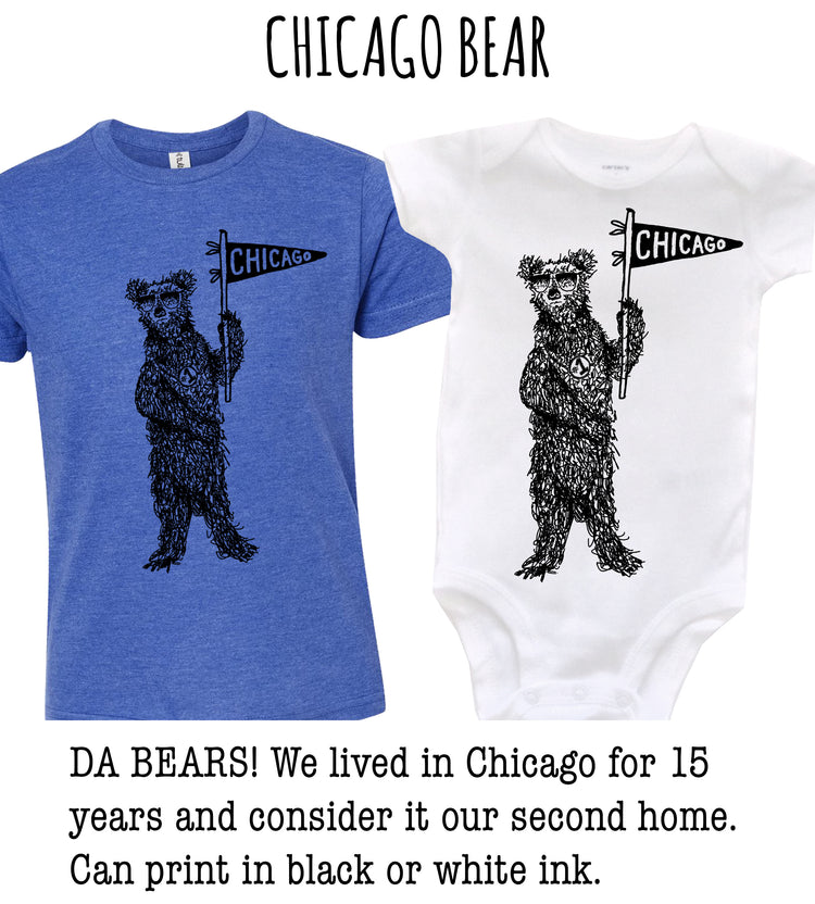 two t-shirts with a graphic of a bear holding a Chicago flag, along with text that reads "Chicago Bear" and "DA BEARS! We lived in Chicago for 15 years and consider it our second home. Can print in black or white ink."