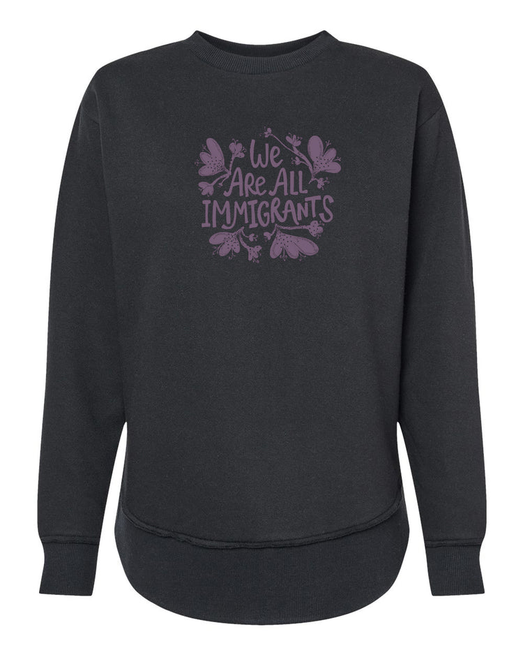 A black sweatshirt with a purple graphic design on the front that reads "We Are All Immigrants".