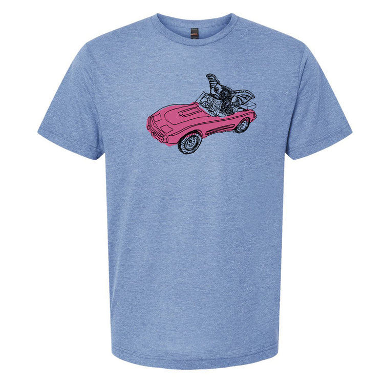A blue t-shirt with a graphic design depicting a pink car with a person wearing a hat and sunglasses riding in it.