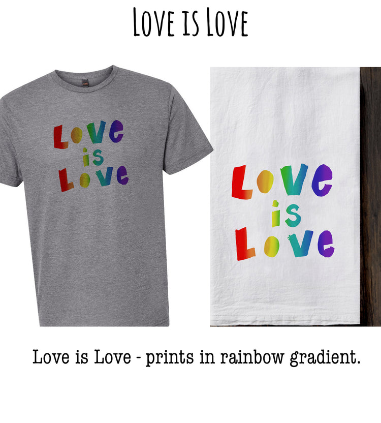 a gray t-shirt with the text "Love is Love" printed on it, along with a white towel or dish with the same text printed on it. The text is in a rainbow gradient color scheme.