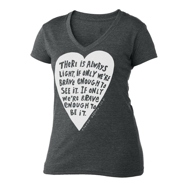 The image is a gray t-shirt with a white heart-shaped graphic and text printed on it.