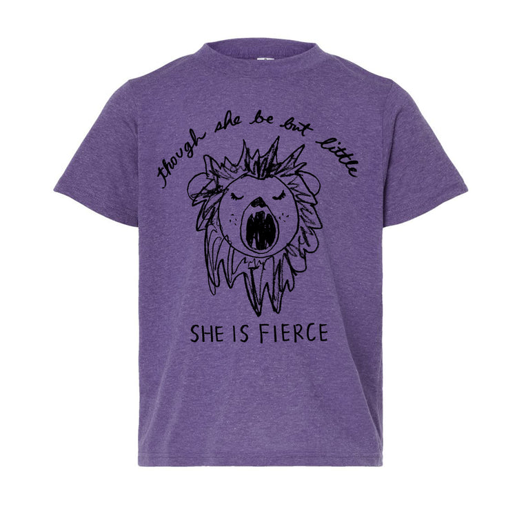 A purple t-shirt with a graphic design depicting a lion's head and the text "She is fierce" printed on it.