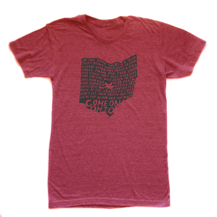 A red t-shirt with a graphic design featuring the text "COME ON OTHIO" in a stylized font, along with various phrases and words related to the state of Ohio.