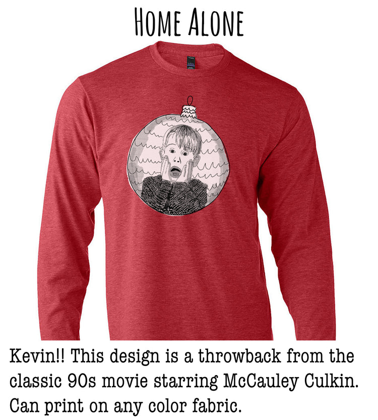 A red long-sleeved t-shirt with a graphic design featuring a character from the classic 90s movie "Home Alone".