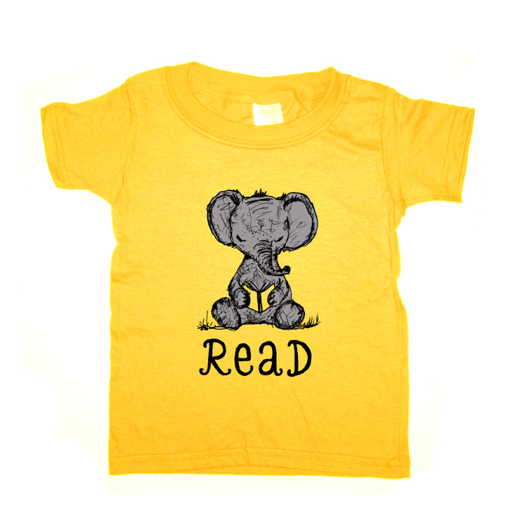 A yellow t-shirt with a cartoon elephant holding a book and the text "Read" below it.