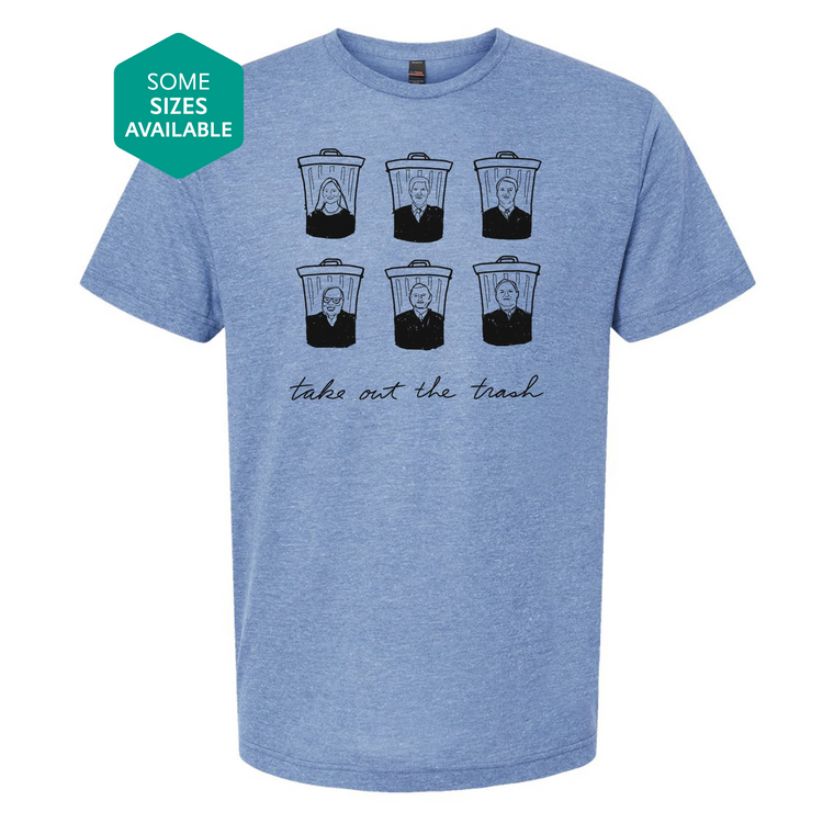 a blue t - shirt with a picture of a man's face on it