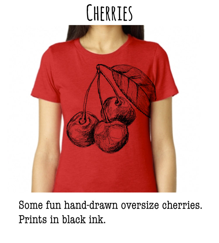 A red t-shirt with a hand-drawn illustration of cherries and a leaf.
