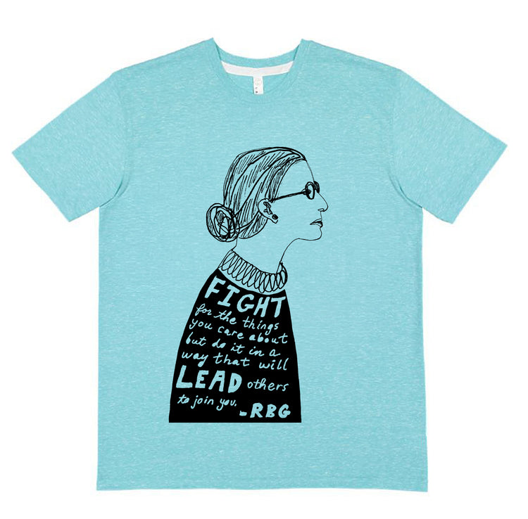 A teal-colored t-shirt with a black and white illustration of a woman's profile and a quote printed on it.
