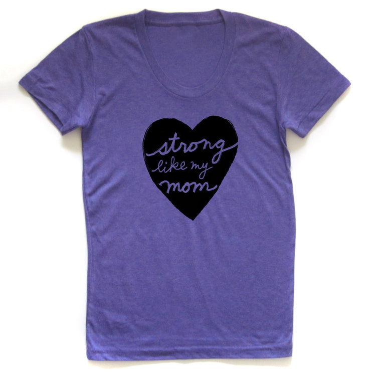 A purple t-shirt with a heart-shaped graphic and the text "Strong like my mom" printed on it.