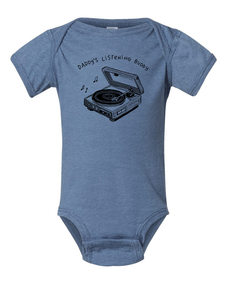 A blue baby onesie with a graphic of a record player and the text "DADDA'S LISTENING BUDDY" printed on it.