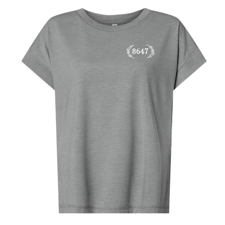 A gray t-shirt with the number 8647 printed on the left side of the chest.