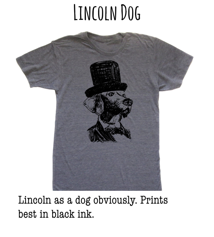 A gray t-shirt with a black and white illustration of a dog wearing a top hat.
