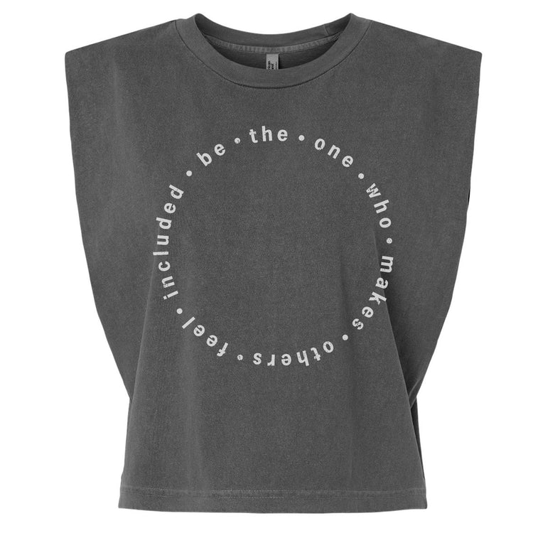A gray crop top with a circular design featuring the text "be the one who makes others feel better" printed on it.