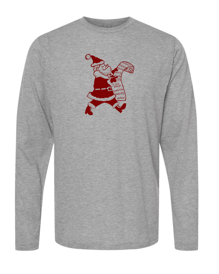 A gray long-sleeve t-shirt with a red graphic design depicting a cartoon Santa Claus figure holding a scroll and a list of Christmas wishes.