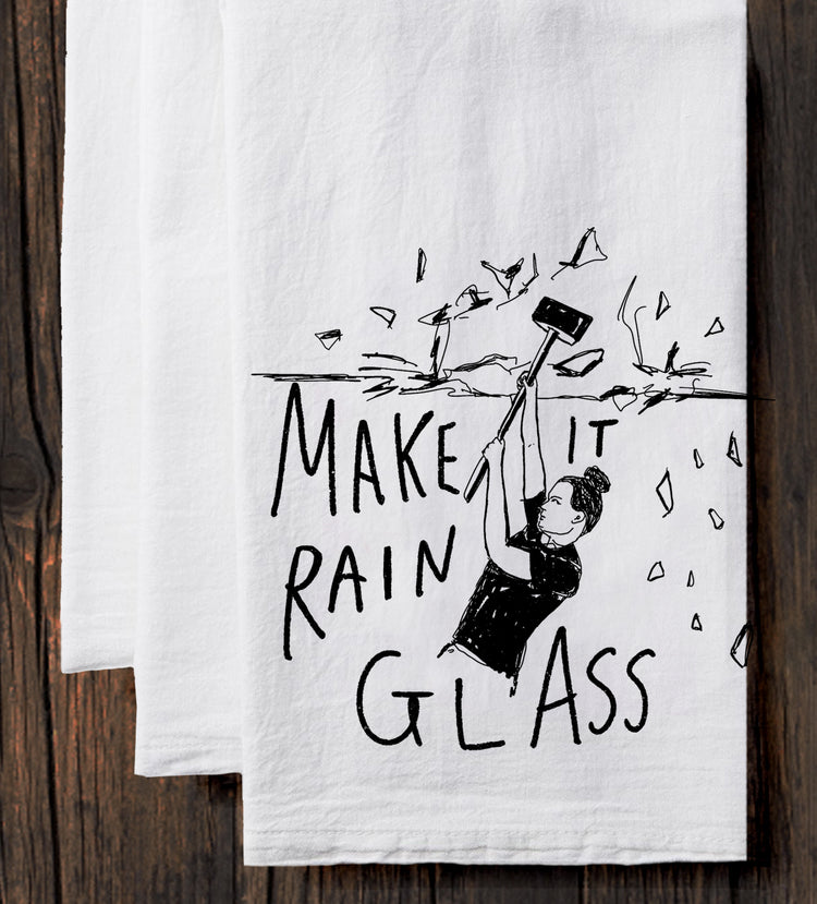 two tea towels with a drawing of a woman holding a kite