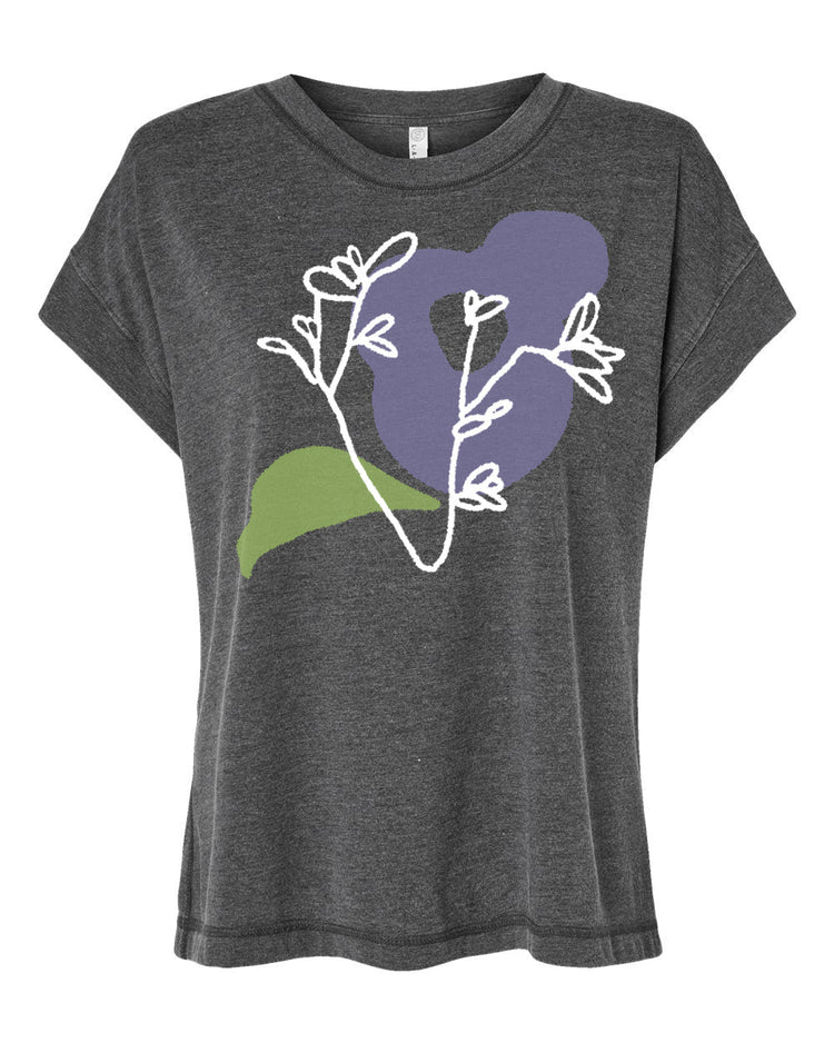 A gray t-shirt with a graphic design featuring a stylized purple flower and green leaves.