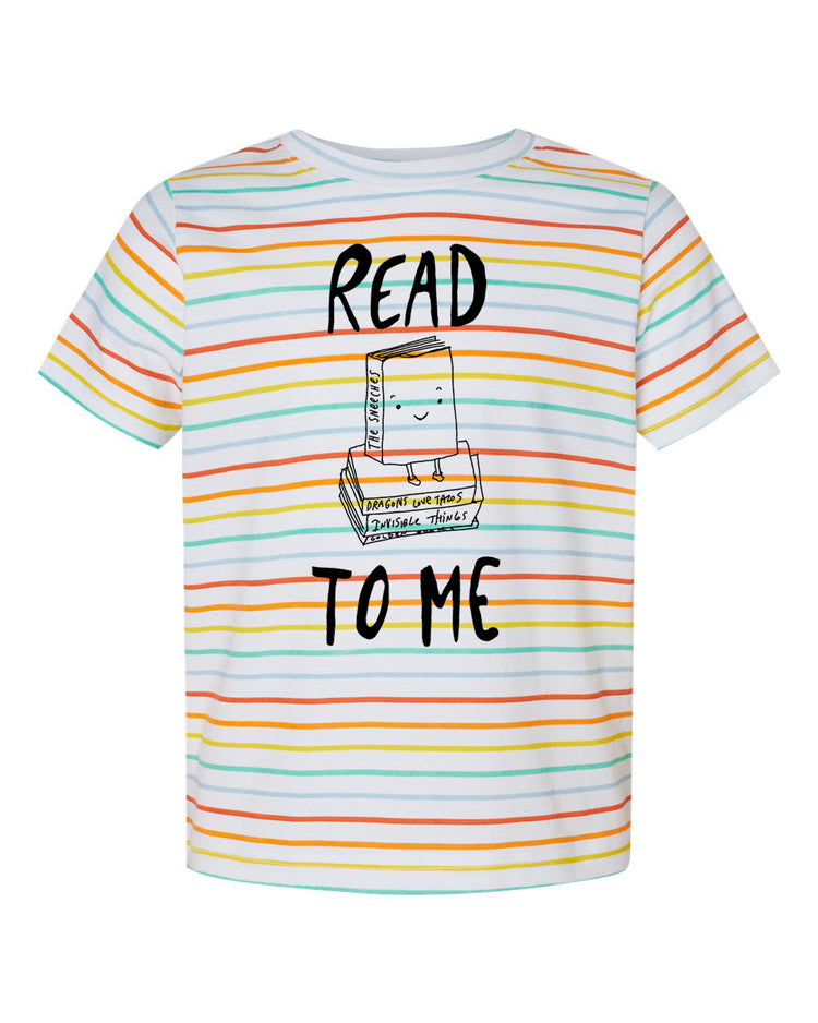 A striped t-shirt with a graphic design featuring a smiling book character and the text "READ TO ME" printed on it.