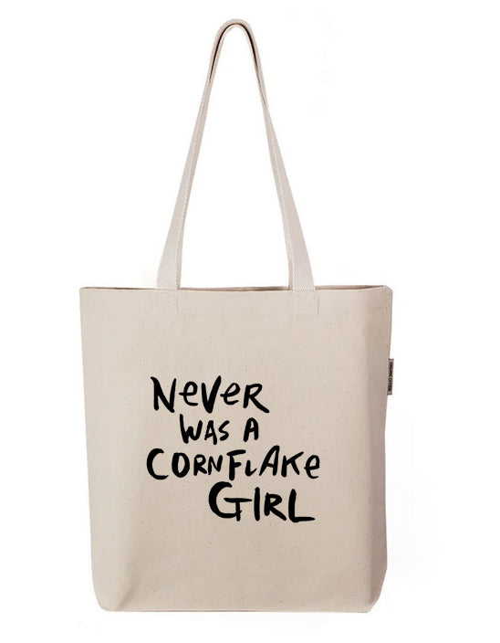 a white tote bag with black writing that says never was a cornflake