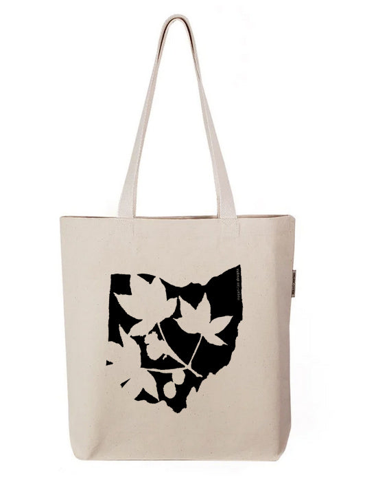 a white bag with a black and white picture of a cat