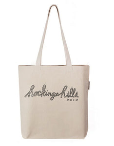 a white tote bag with a logo on it