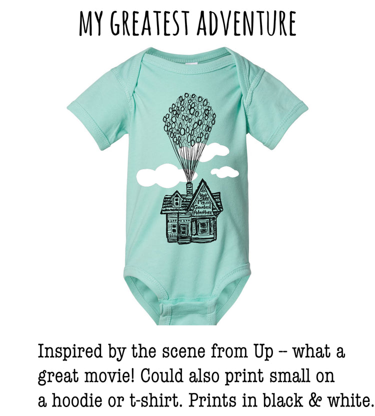 A mint green onesie with a graphic of a house and balloons floating above it, inspired by the scene from the movie "Up".