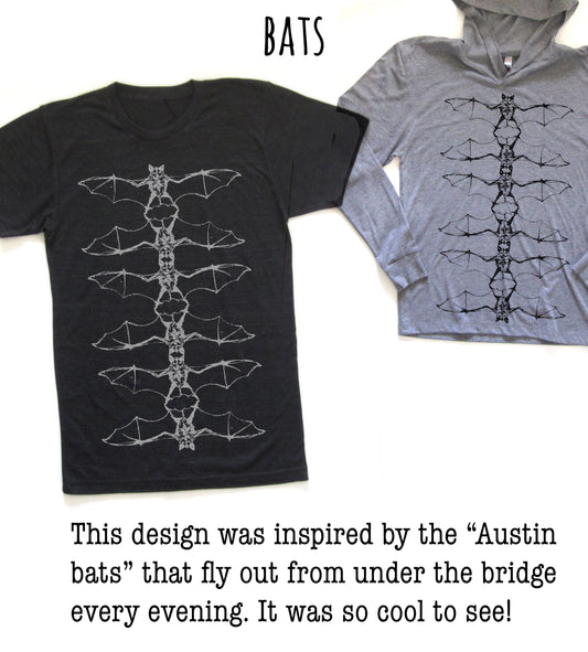 two t-shirts with a unique bat design, inspired by the "Austin bats" that fly out from under the bridge every evening. The design is described as cool to see, suggesting that it is visually appealing and interesting.