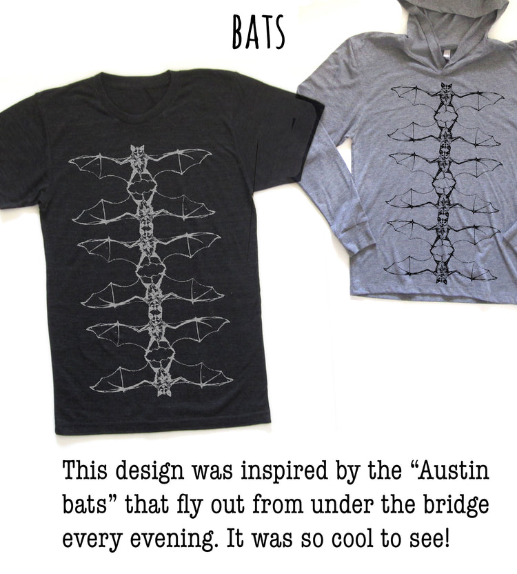 two t-shirts with a unique bat design, inspired by the "Austin bats" that fly out from under the bridge every evening. The design is described as cool to see, suggesting that it is visually appealing and interesting.
