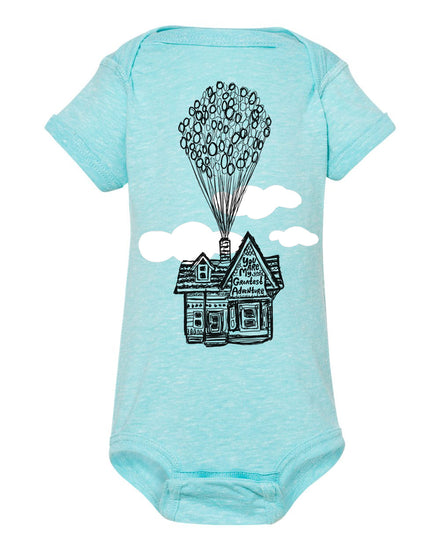 A light blue baby onesie with a graphic of a house and balloons floating above it.