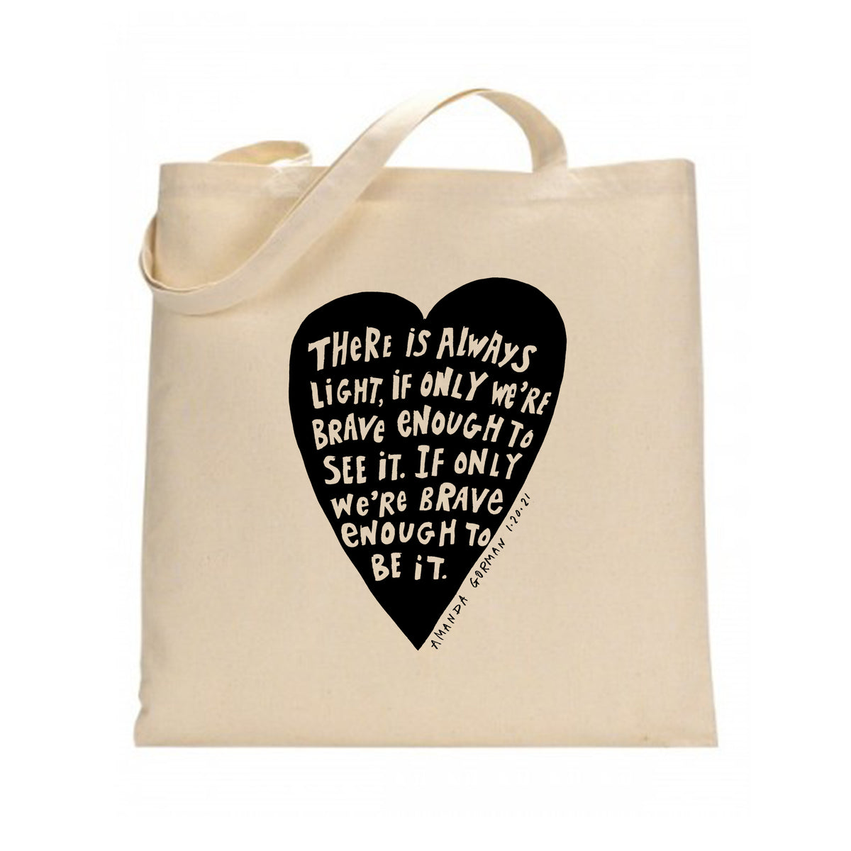 a beige tote bag with a black heart-shaped design containing a motivational quote.