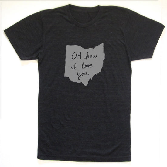 A black t-shirt with a graphic design featuring a handwritten message that reads "OH how I love you" inside a shape resembling the Ohio state map.