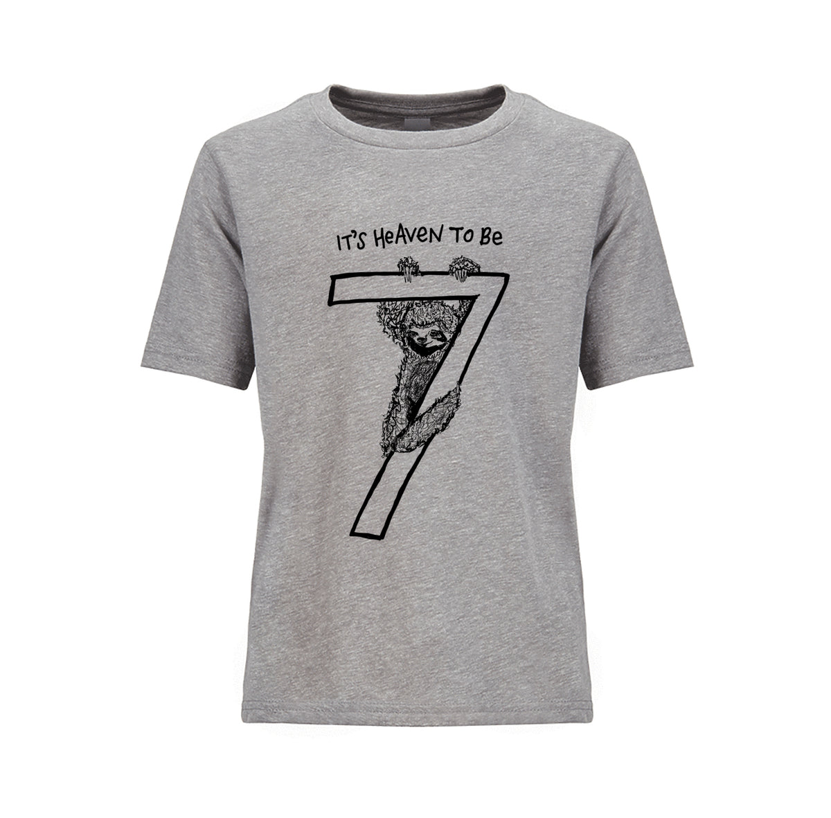 A gray t-shirt with a graphic design depicting a sloth hanging from a tree branch with the text "It's Heaven to Be" above it.