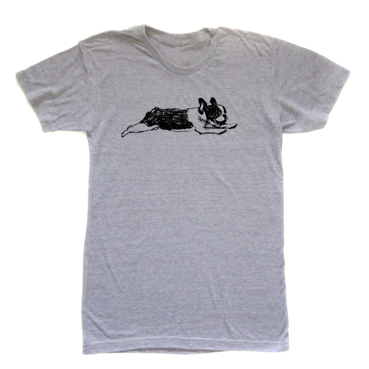 A gray t-shirt with a black and white illustration of a dog lying down.