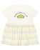 A white t-shirt with a graphic design and a striped skirt.