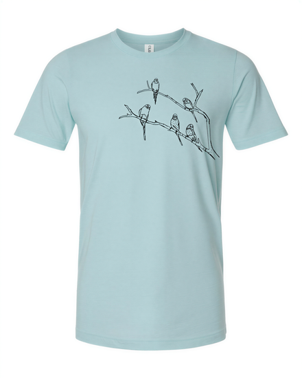 A light blue t-shirt with a black and white graphic design depicting a group of birds perched on a branch.