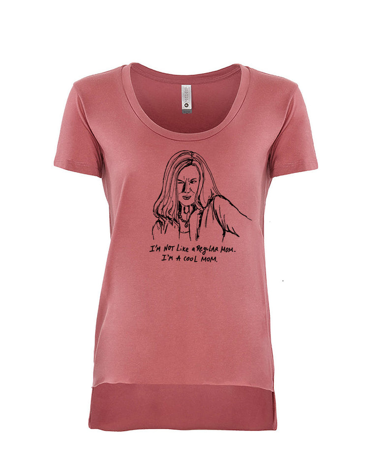 A pink t-shirt with a black and white illustration of a woman and text below the illustration.