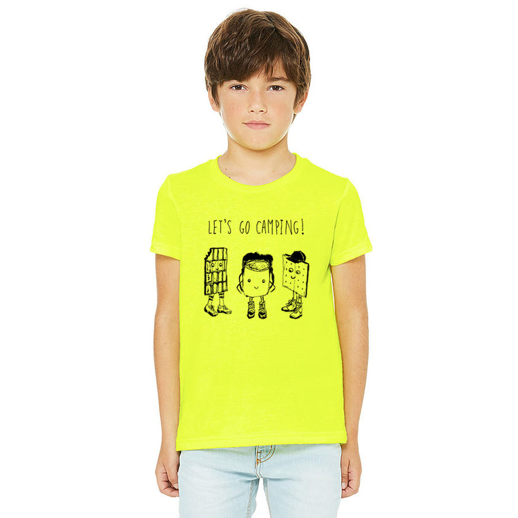 A young boy wearing a bright yellow t-shirt with a cartoon character and text printed on it.