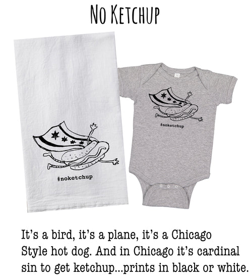 a gray baby onesie with a graphic of a bird, a plane, and a Chicago style hot dog, along with the text "#noketchup" printed on it. The text also describes the onesie as a "bird, it's a plane, it's a Chicago Style hot dog. And in Chicago it's cardinal sin to get ketchup...prints in black or white."