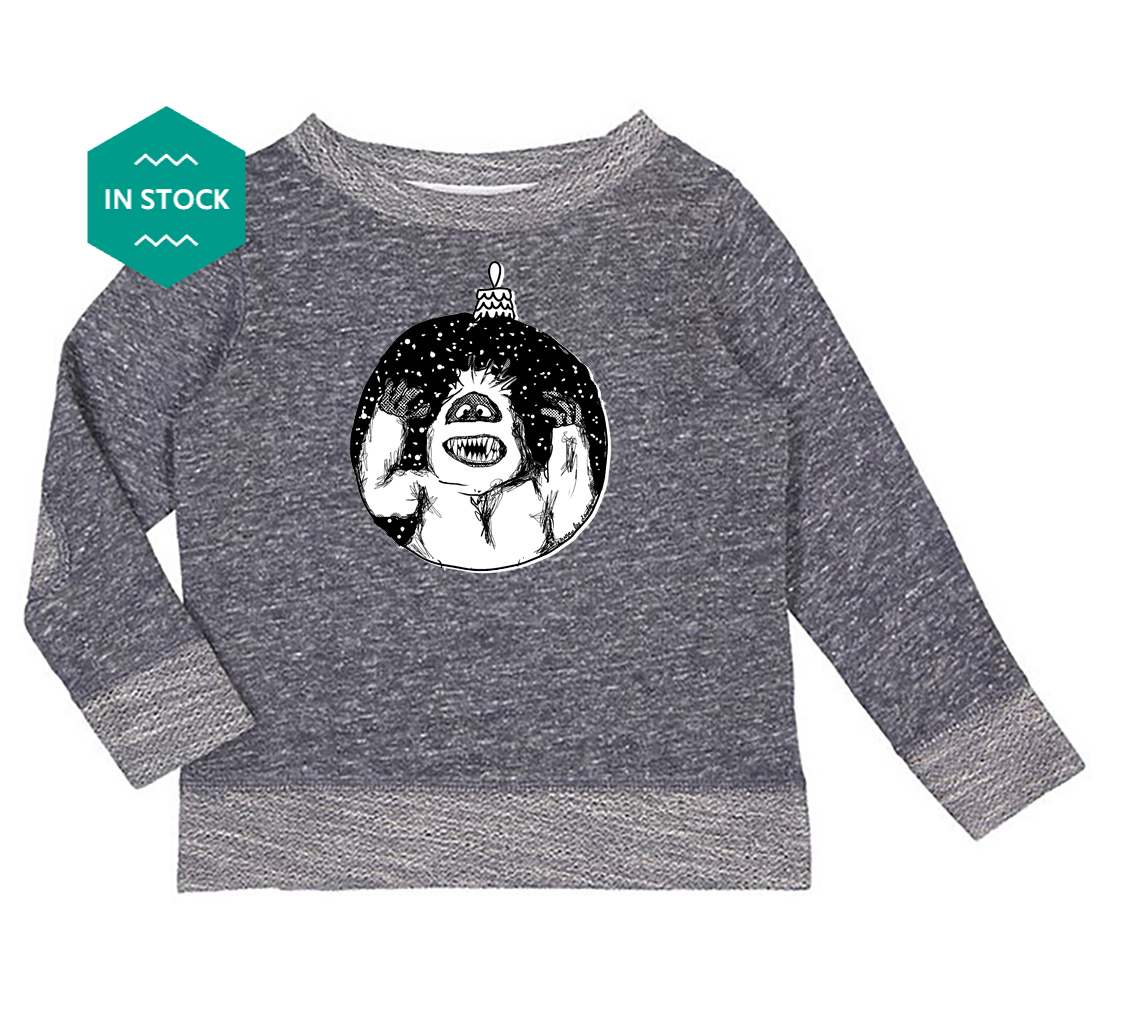 a gray sweater with a monkey on it
