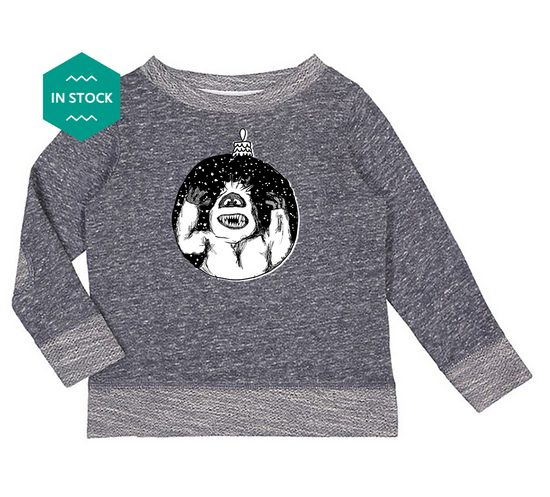 a gray sweater with a monkey on it