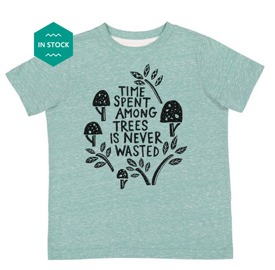 a t - shirt with the words time spent among trees is never wasted