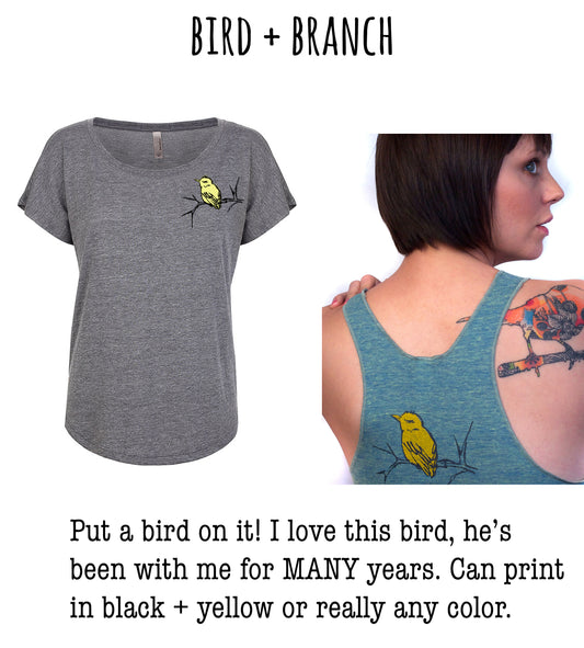 The image is a collage of two photos. The first photo shows a gray t-shirt with a yellow bird design on the front, and the second photo shows a woman with a tattoo of a bird on her shoulder.