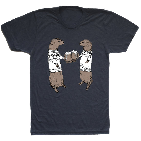 A black t-shirt with a graphic design depicting two otters wearing sweaters and holding beer glasses, appearing to be enjoying a drink together.