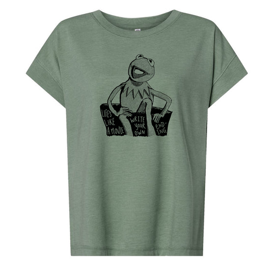 A green t-shirt with a graphic design featuring a frog character and text that reads "Life's like a movie, write your own ending".