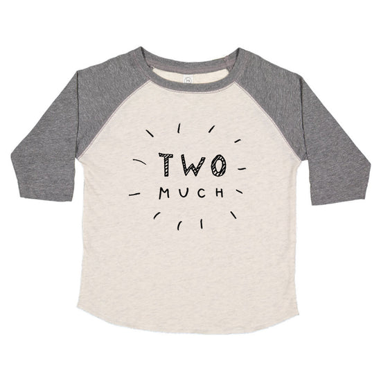 A gray and white long-sleeved shirt with a graphic design on the front that says "TWO MUCH".