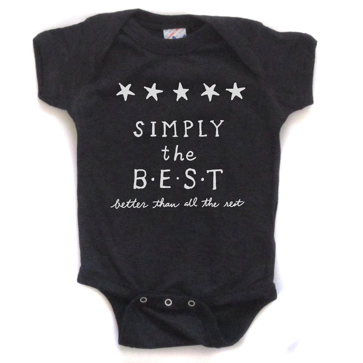A black baby onesie with white text and stars on it.