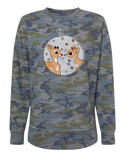 A camo-patterned sweatshirt with a graphic of two cartoon reindeer inside a snow globe.